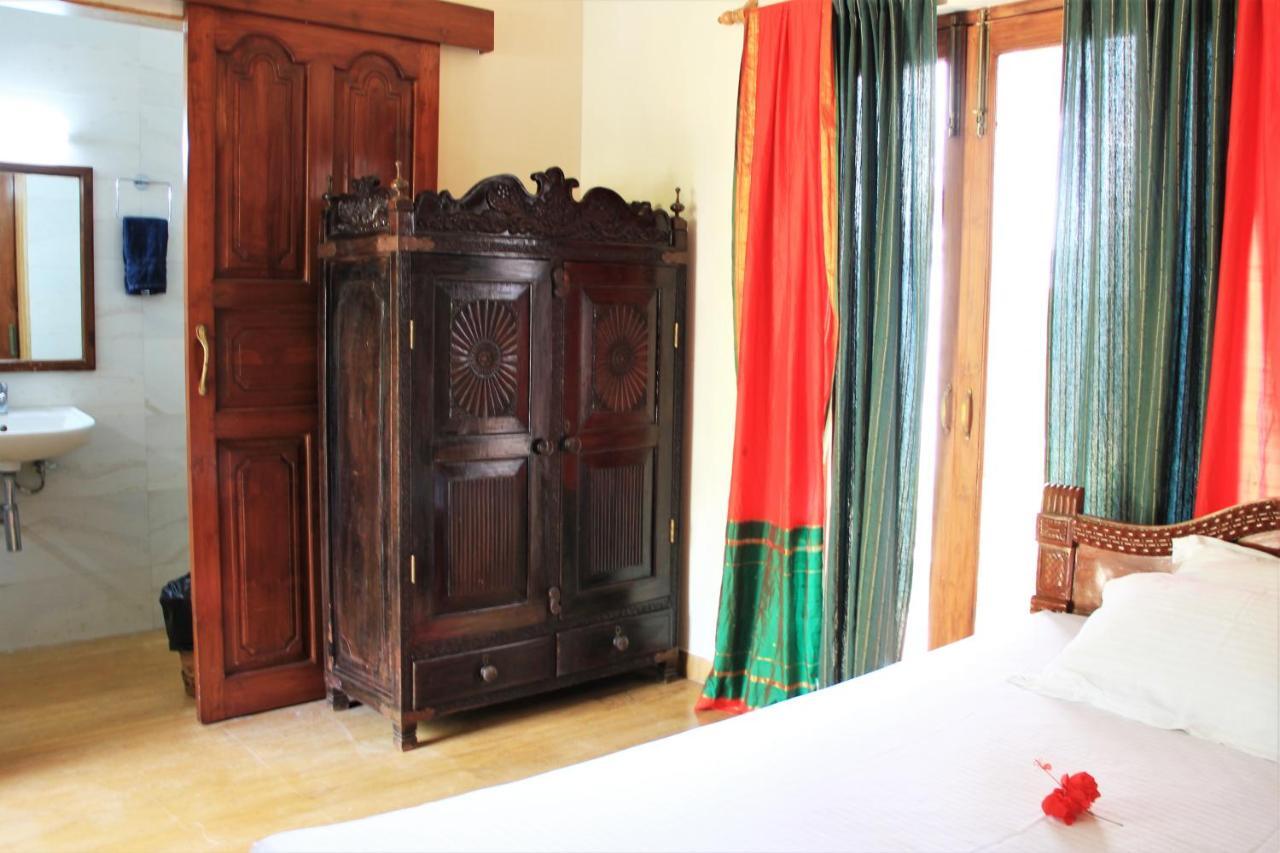 Papa Jolly Eco Resort-Near Morjim Beach Esterno foto